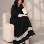 Black Super Nida Half-Kloosh Abaya with Beige Trim from Jelena Abaya.