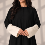 Black Super Nida Half-Kloosh Abaya with Beige Trim from Jelena Abaya.