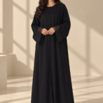 Front view of black Super Nida half-kloosh abaya 1073 with black appliqué.