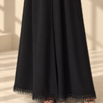 Front view of black Super Nida half-kloosh abaya 1073 with black appliqué.