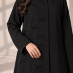 Model wearing open black Kubra quarter-kloosh abaya 1074 with glossy diagonal front detail.