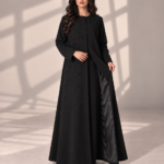 Model wearing open black Kubra quarter-kloosh abaya 1074 with glossy diagonal front detail.